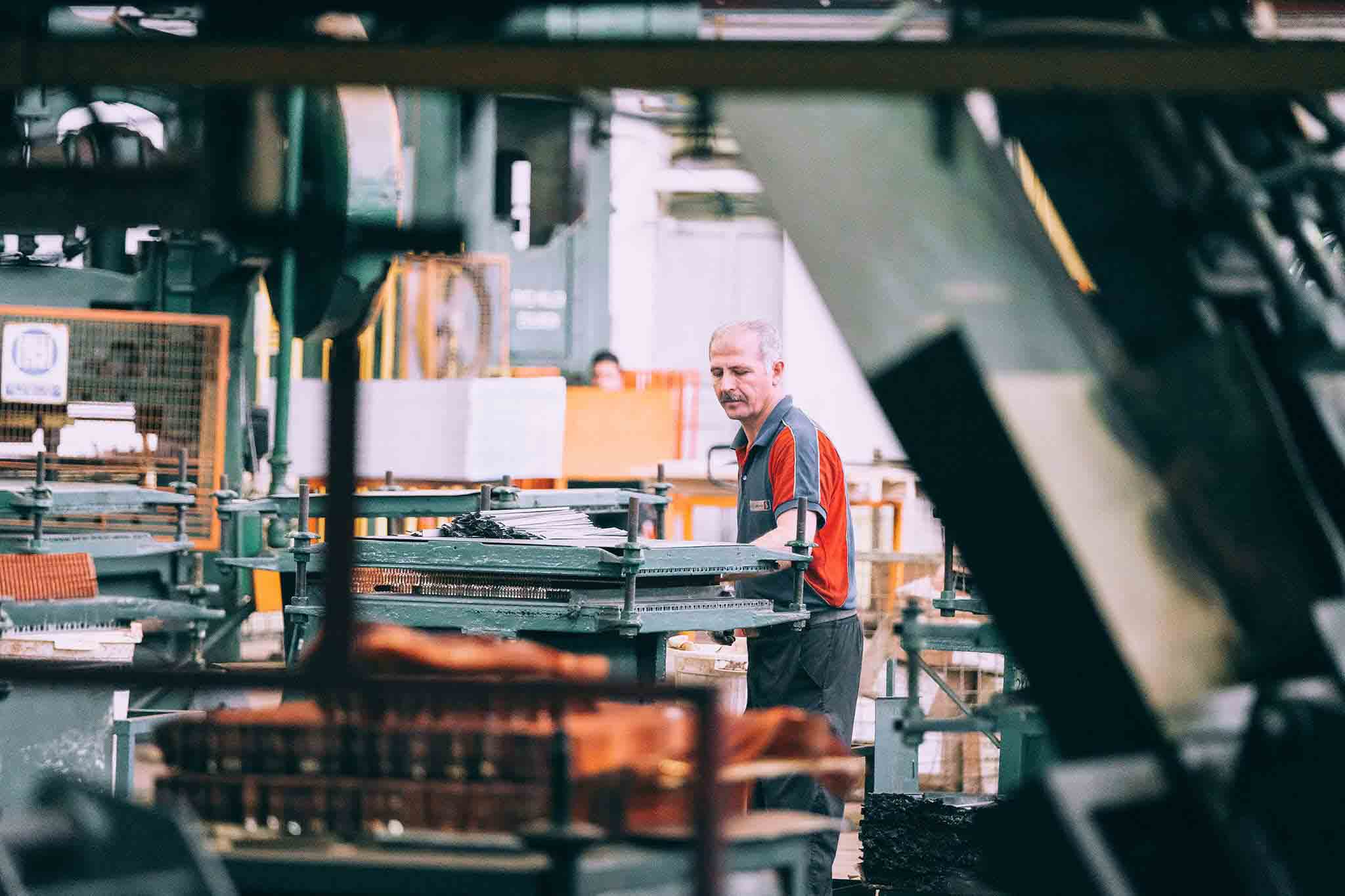 Engineer working on an industrial control panel